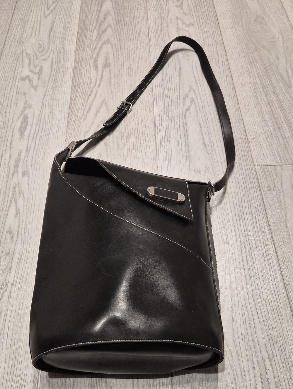 Sleek Black Leather Crossbody Bag with Silver Hardware
